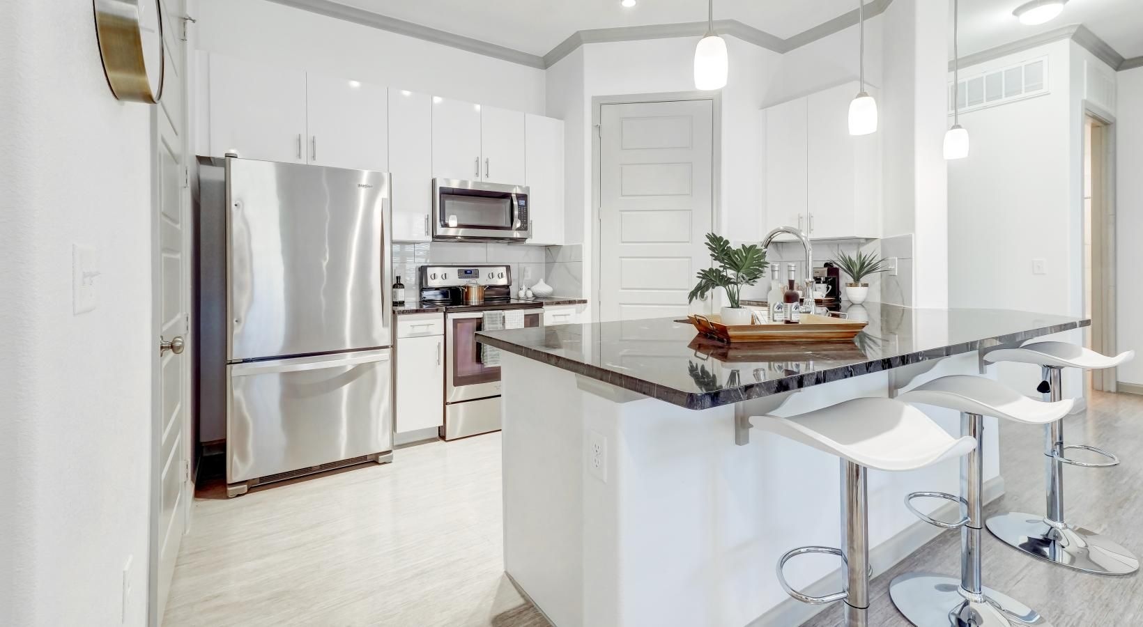 Beautiful kitchens with designer finishes a kitchen with white cabinets
