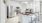 a kitchen with white cabinets