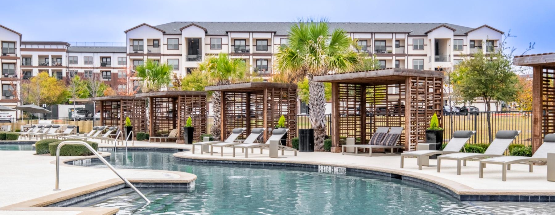 a pool with a building in the background