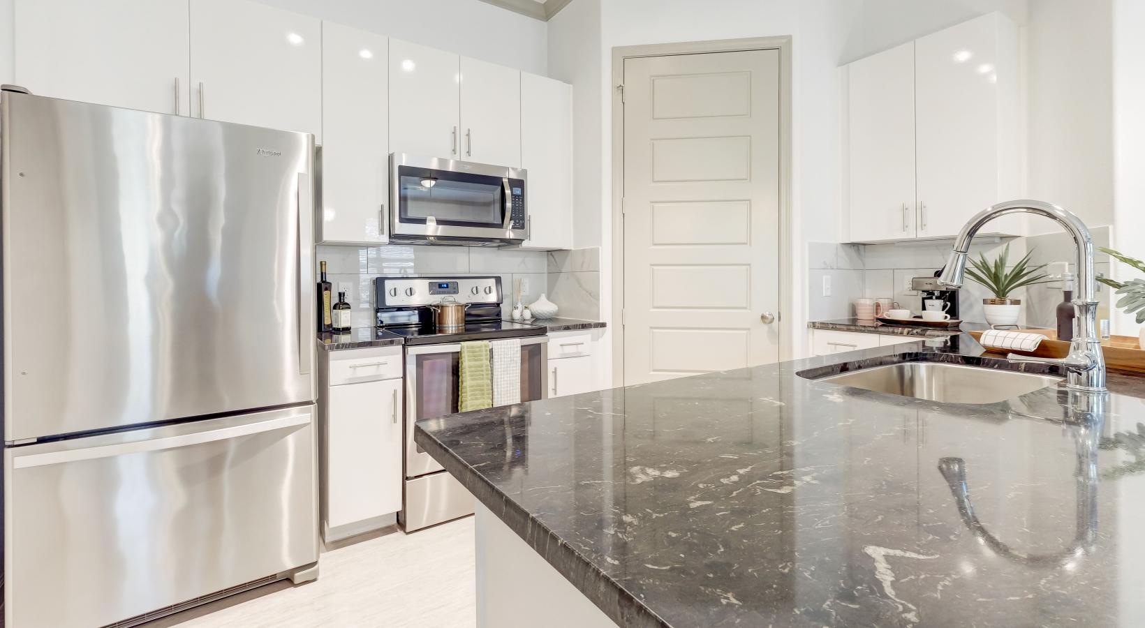 Beautiful kitchens with designer finishes a kitchen with white cabinets