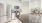 a kitchen with white cabinets
