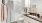 a bathroom with a tub sink and toilet