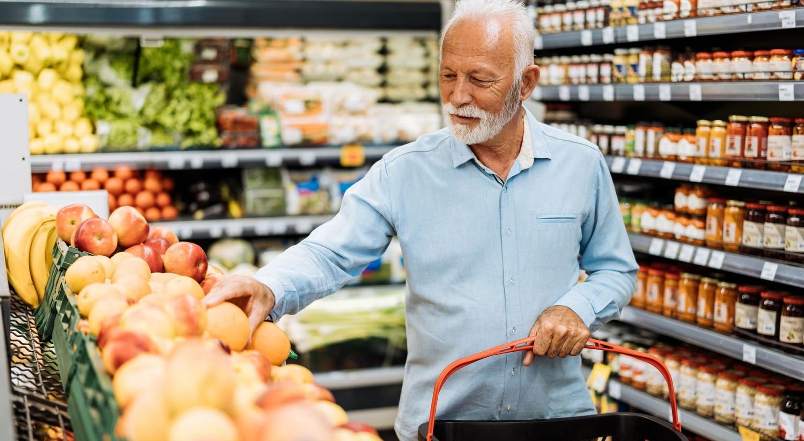 The essence of exceptional living a person holding a shopping cart in a grocery store