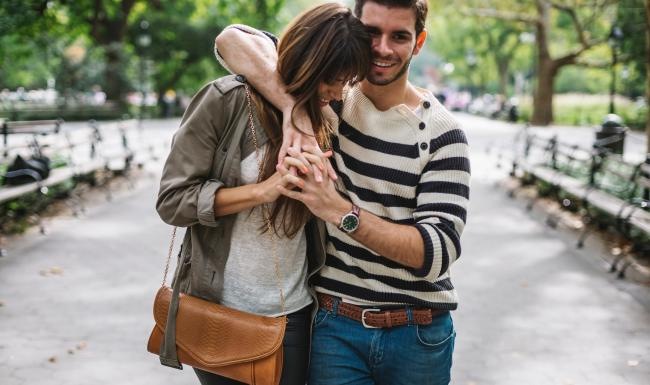 a man and woman kissing