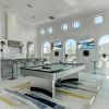 a large room with a large table and a large window